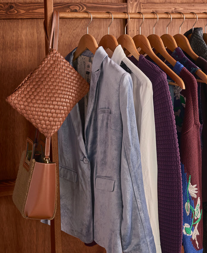New clothing from cabi's Fall 2025 Collection displayed on a coat rack