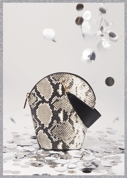 Animated image of confetti falling with the Mini Serpent Bag in Snakeskin.