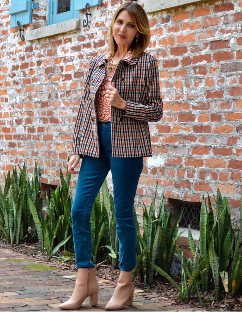 Fashion influencer wearing the Jazzy Jacket in Toffee Plaid, Twirl Top in Russet Twist, High Skinny in Moroccan Blue.