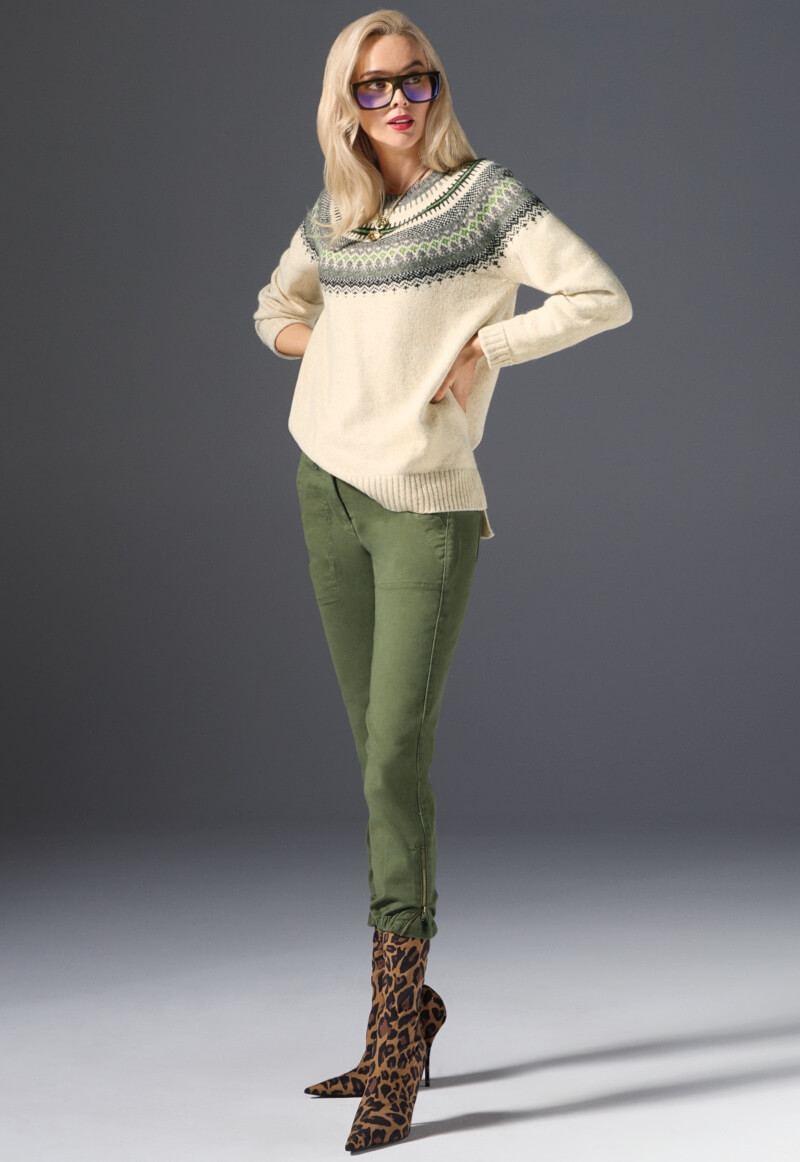 Model Wearing Shetland Pullover in Fair Isle, Compass Pant in Army Green, Jaguar Necklace in Gold.