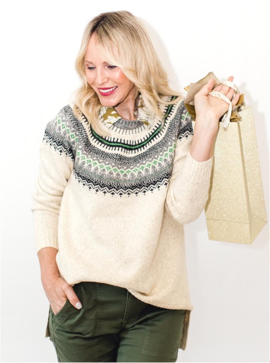 Influencer model wearing Shetland Pullover in Fair Isle, Flurry Top in Haute Camo, and Compass Pant in Army Green.