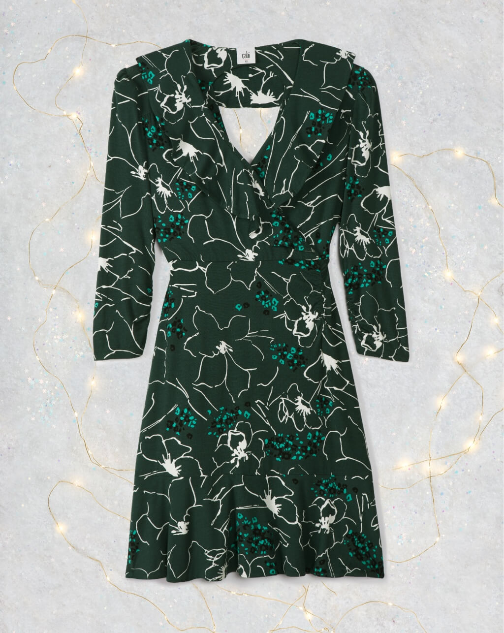 Ruffle Up Dress in Winter Floral with snowflakes and lights as accents.