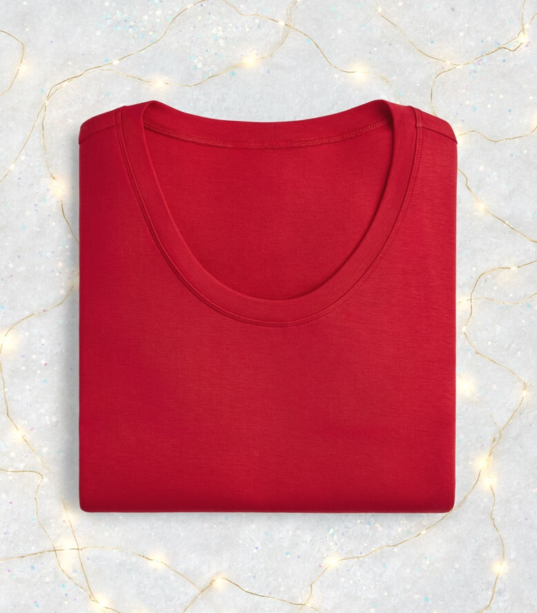 Toss On Tee in Scarlet with snowflakes and lights as accents.