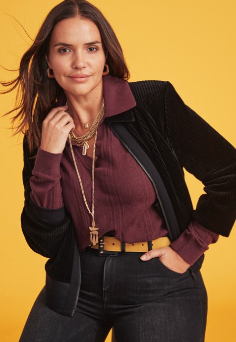 Model is wearing Athena Pullover in Vineyard, High-Low Crop in Washed Black, Team Jacket in Black, Ornament Belt in Black Combo, Chime Necklace in Gold, Dream Weaver Necklace in Gold, Fable Necklace in Gold, and Fable Earrings in Gold.