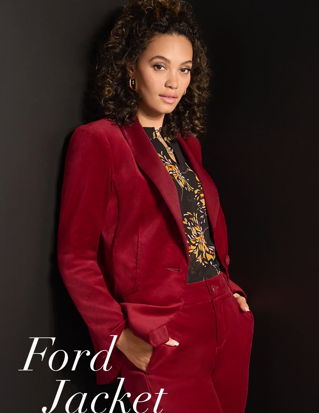 Model wearing Ford Jacket in Cherry, Ford Trousers in Cherry, and the Fiesta Blouse in Starflower.