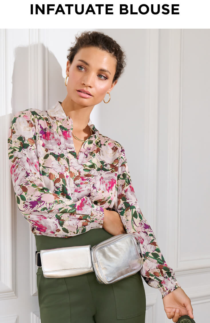 Model wearing Infatuate Blouse in Floral Print, Chargo in Olive, Chain Hoop Earrings in Gold and Alias Necklace in Gold.