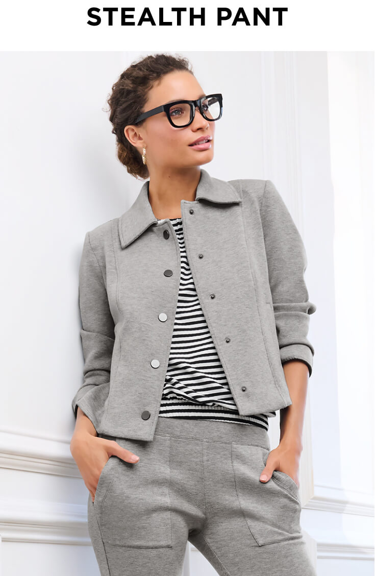 Model wearing Stealth Pant in Heather Gray, Stealth Jacket in Heather Gray, Chat Tee in Black and Cream, and Chain Hoop Earrings in Gold.