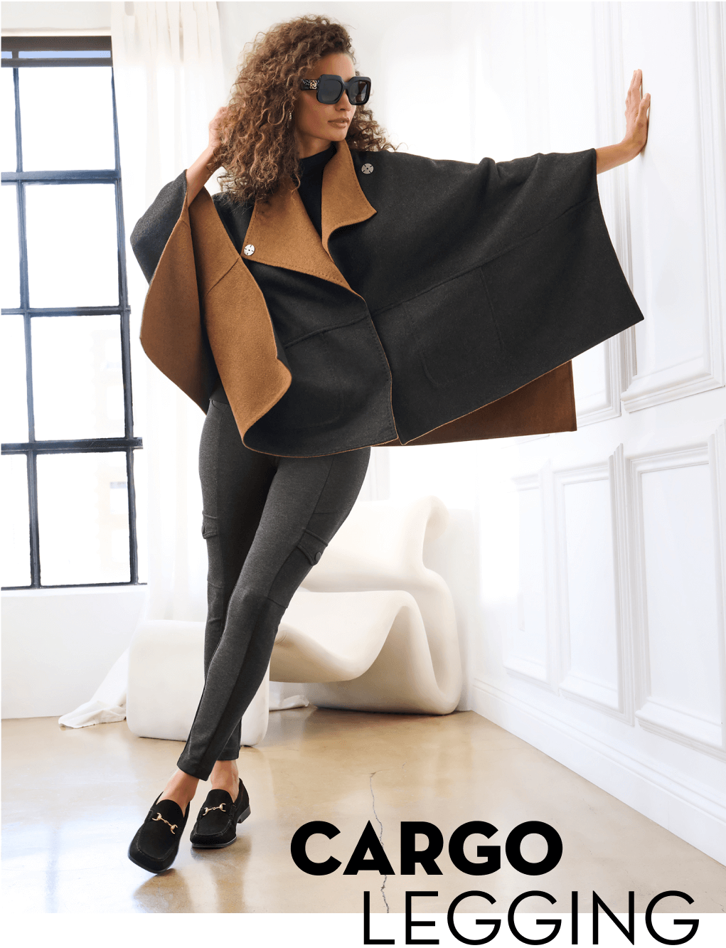 Model wearing Good Hope Cape in Multi and Cargo Legging in Charcoal.