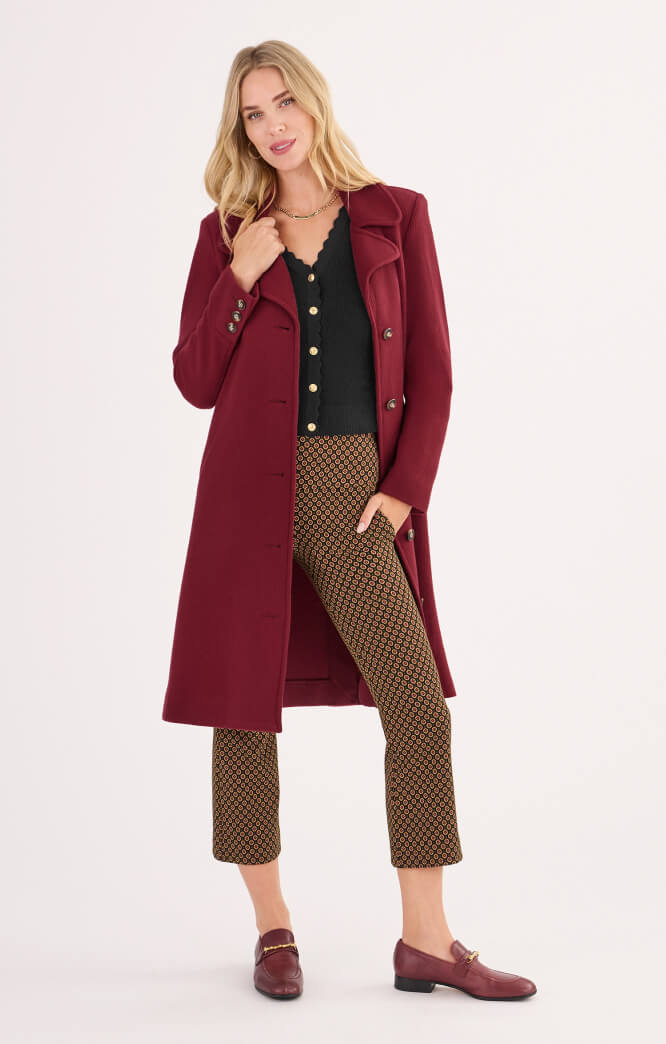 Model wearing Coming in Hot Topper in Brick, Treasure Cardigan in Black, and Dandy Pant in Peppercorn.