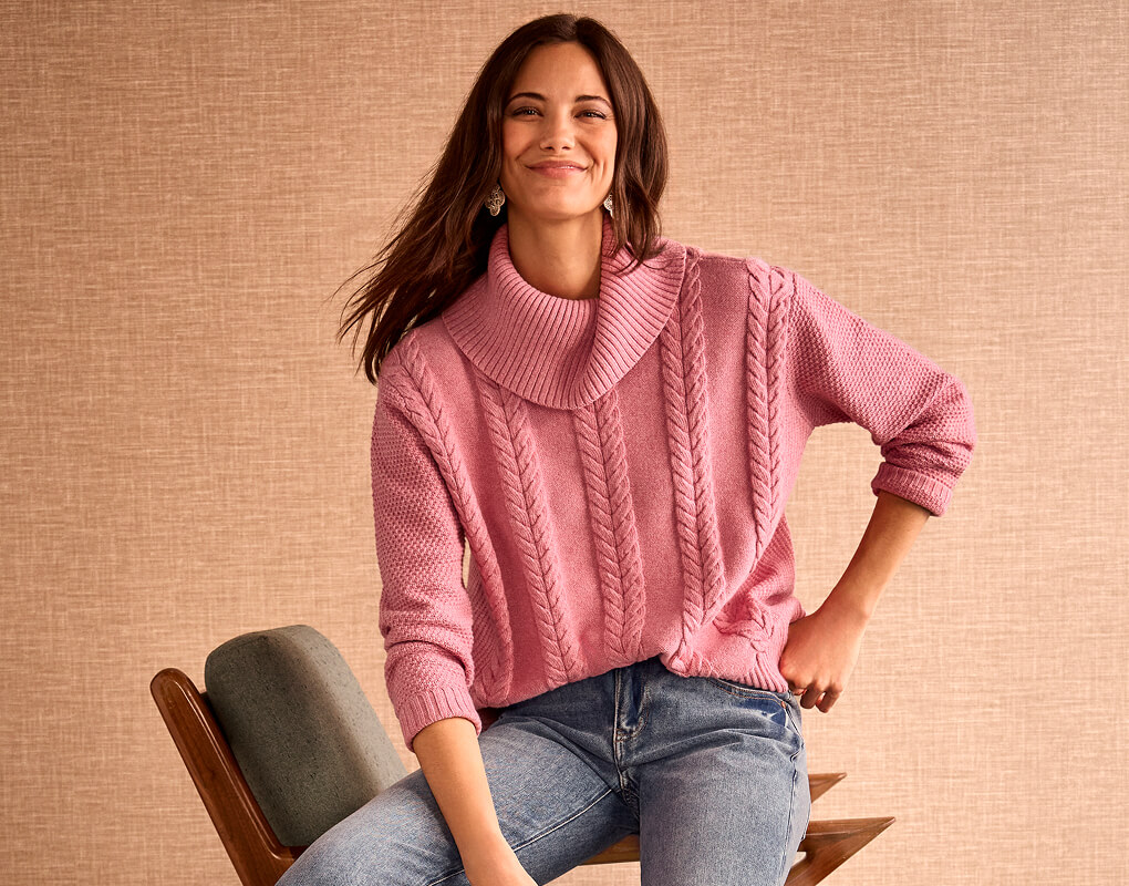 Model wearing the Blush Turtleneck and the Harlow Jean